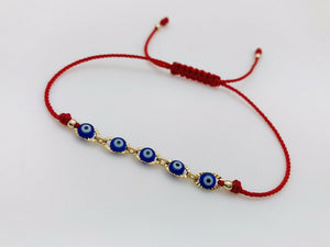 Pulsera Roja Con Ojitos Azules Oro Laminado